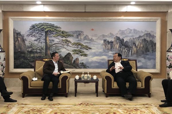 中国西部开发促进会与国家开发银行云南省分行座谈2.jpg
